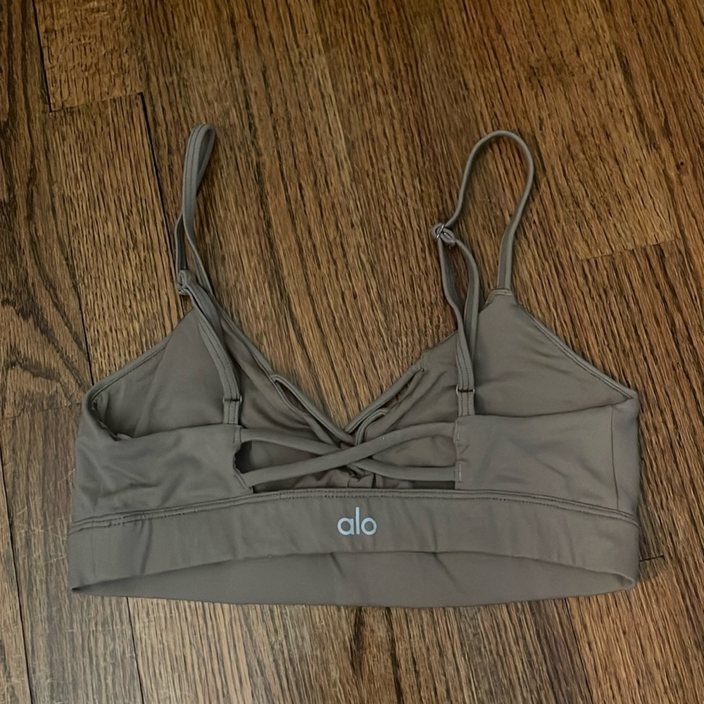Grey Criss Cross Alo sports bra with adjustable straps
